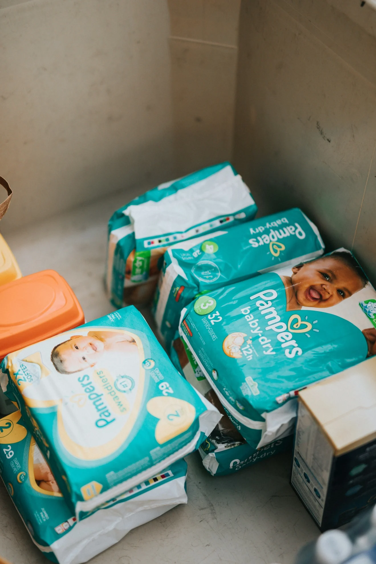Packets of newborn diapers and baby supplies